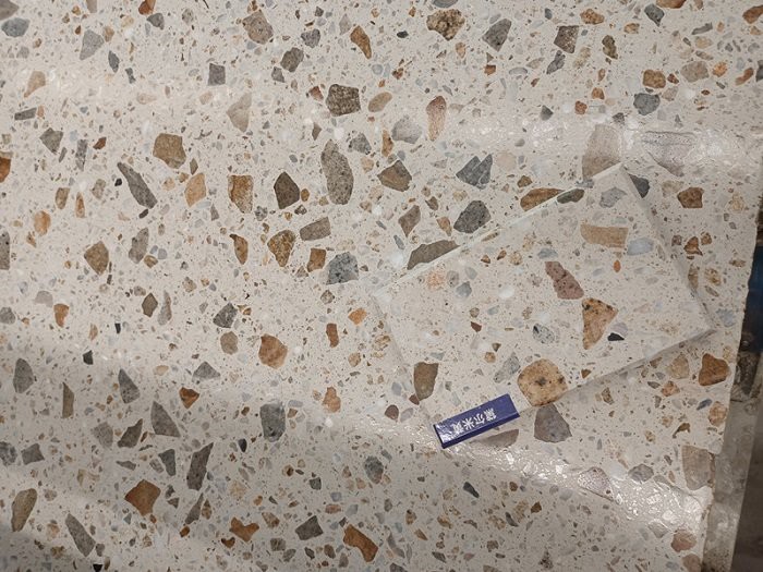 Beige terrazzo slabs vanity
