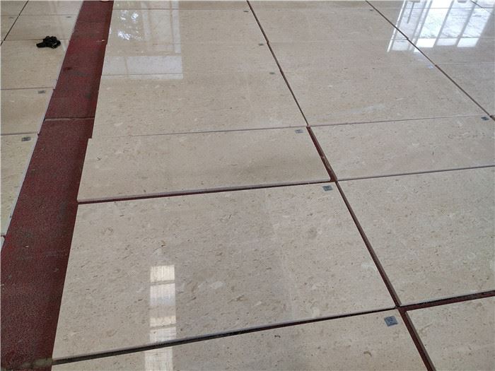 beige marble tile bathroom polished
