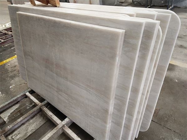 white and gold marble slabs